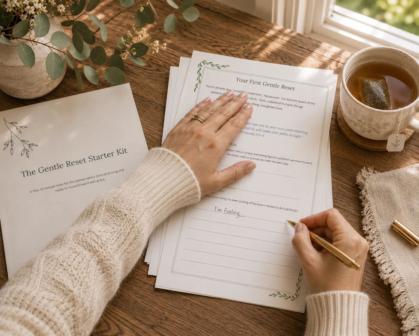 A woman journaling in the Gentle Reset Starter Kit